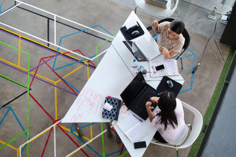 business owners discussing lead generation software tools